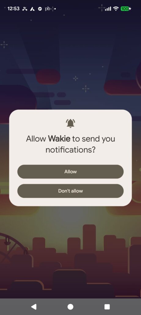 A system permission pop-up box displaying on a mobile device screen against a dark background graphic. The modal window shows a notification bell icon with the system text prompt "Allow Wakie to send you notifications?" along with two distinct tapping choices labeled "Allow" and "Don't allow